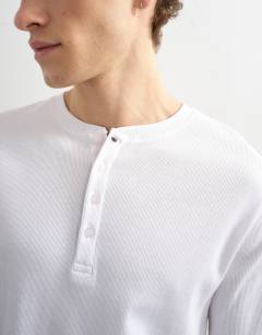 Model wearing Classic fit ribbed henley t-shirt in white