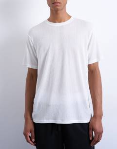 Model wearing Classic fit sheer rib t-shirt in white 