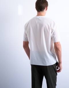 Model wearing Classic fit sheer t-shirt in white