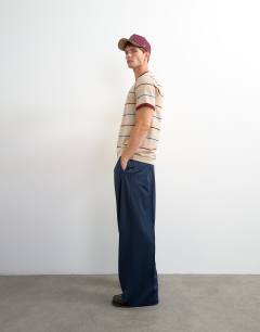 Model wearing Classic fit striped t shirt in oatmeal