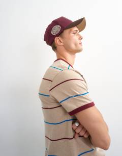 Model wearing Classic fit striped t shirt in oatmeal