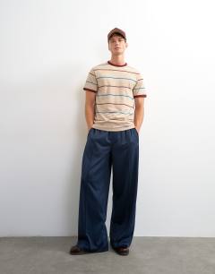 Model wearing Classic fit striped t shirt in oatmeal
