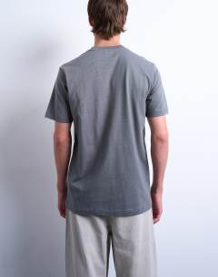 Model wearing Classic fit t-shirt in charcoal