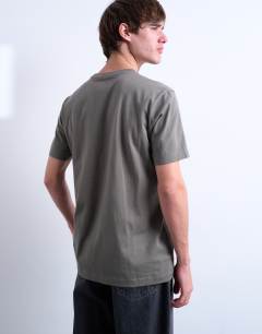 Model wearing Classic fit t-shirt in olive 