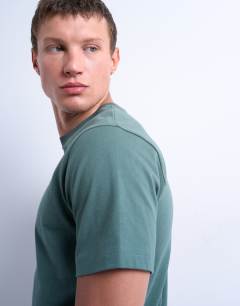Model wearing Classic fit t-shirt in sage
