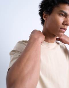 Model wearing Classic fit t-shirt in stone