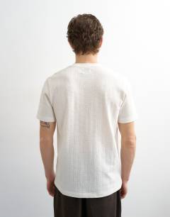 Model wearing Classic fit textured t-shirt in cream