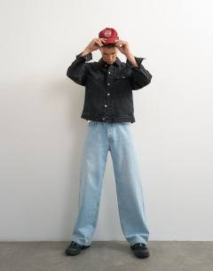 Model wearing Classic fit western denim jacket in washed black