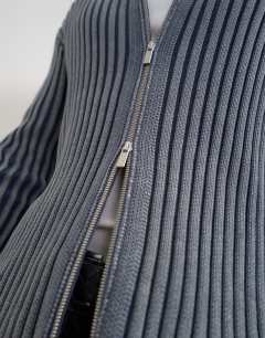 Model wearing Classic fit zip through knitted jumper with thick ribbing in washed grey