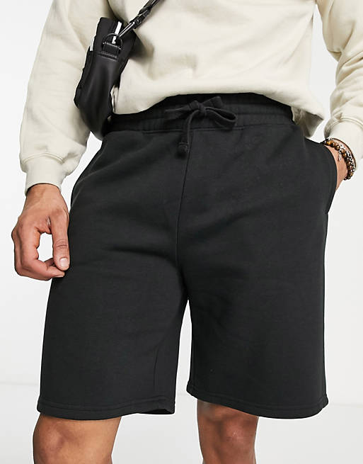 Confezione da 2 paia di pantaloncini oversize neri e kaki Asos Uomo Abbigliamento Pantaloni e jeans Shorts Pantaloncini 
