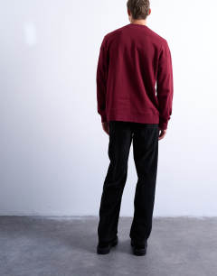 Model wearing Cord baggy trouser in black