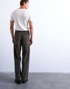 Model wearing Cord baggy trouser in khaki