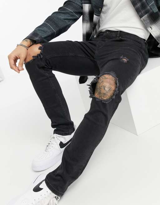 Ripped Knee Blowout Slim Jeans