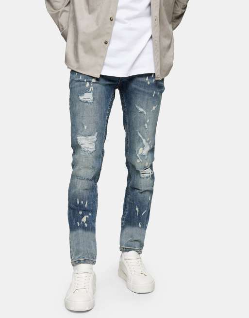 Topman cotton blend stretch skinny rip and repair jeans in mid wash 