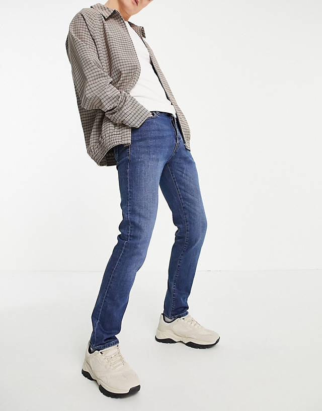 Topman - cotton blend stretch slim jeans in mid wash - mblue