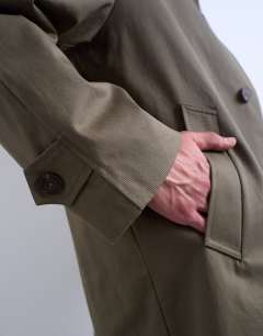 Model wearing Cotton canvas overcoat in khaki