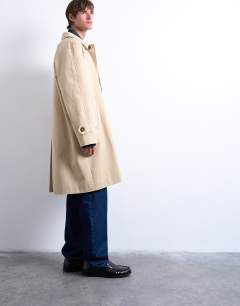 Model wearing Cotton canvas overcoat in stone