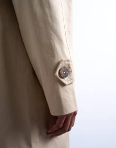 Model wearing Cotton mac in stone