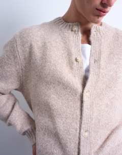 Model wearing Crew neck cardigan in stone