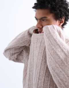 Model wearing Crew neck jumper in oat rib