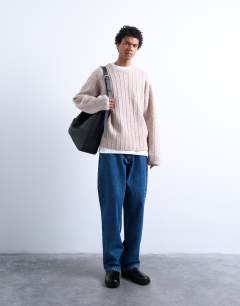 Model wearing Crew neck jumper in oat rib