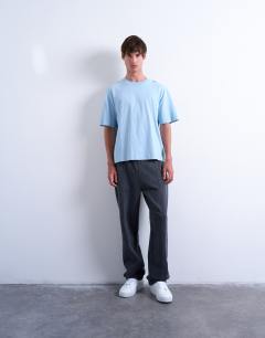 Model wearing Crop fit t-shirt in light blue