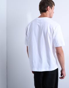 Model wearing Crop fit t-shirt in white