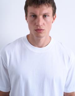Model wearing Crop fit t-shirt in white