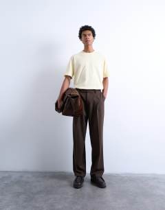 Model wearing Crop fit t-shirt in yellow