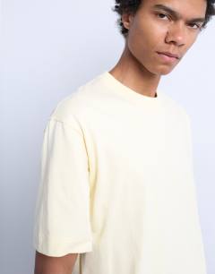 Model wearing Crop fit t-shirt in yellow