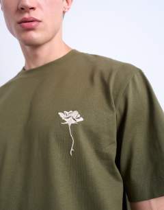 Model wearing Crop fit t-shirt with floral embroidery in khaki