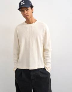 Model wearing Cropped fit long sleeve heavyweight waffle t-shirt in ecru