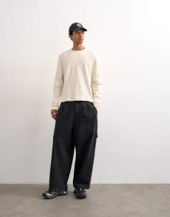 Model wearing Cropped fit long sleeve heavyweight waffle t-shirt in ecru