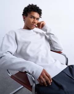 Model wearing Cropped fit long sleeve heavyweight waffle t-shirt in grey