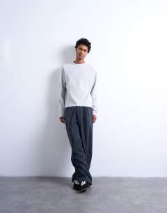 Model wearing Cropped fit long sleeve heavyweight waffle t-shirt in grey