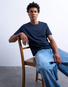 Model wearing Cropped fit slub t-shirt in navy
