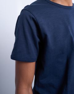 Model wearing Cropped fit slub t-shirt in navy