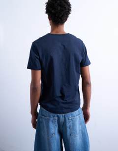 Model wearing Cropped fit slub t-shirt in navy