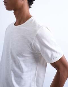 Model wearing Cropped fit slub t-shirt in white