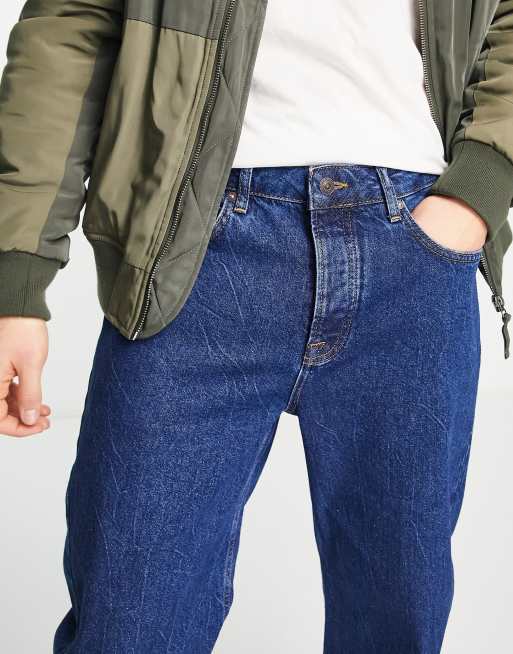 Topman curved leg tapered jeans in indigo