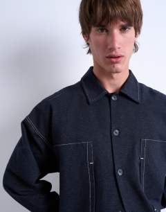 Model wearing Denim look jersey shacket in navy
