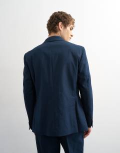 Model wearing Double breasted linen rich blazer in navy