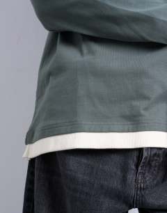 Model wearing Double layer jersey long sleeve tee in sage and cream