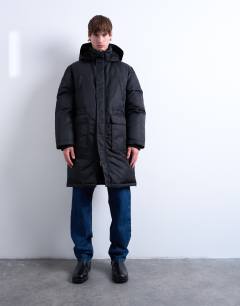 Model wearing Double pocket parka in black