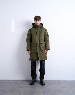 Model wearing Double pocket parka in khaki