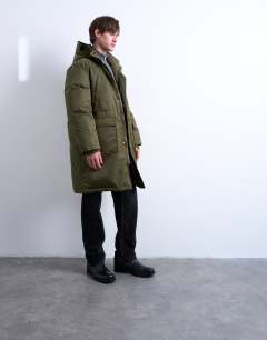 Model wearing Double pocket parka in khaki