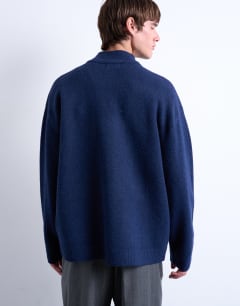 Model wearing Double zip funnel neck cardigan in navy