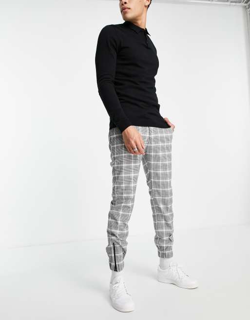 Topman – Eng geschnittene Jogginghose mit Reißverschluss an den Bündchen in Schwarz und Weiß kariert