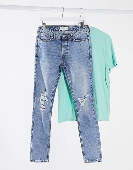 Topman – Eng geschnittene Stretch-Jeans aus Baumwollmix in hellblauer Waschung mit auffälligen Zierrissen - MBLUE