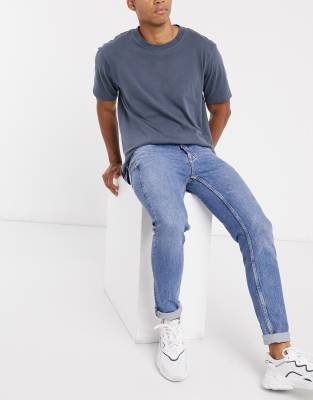 Topman – Enge Jeans aus Baumwolle in verwaschenem Mittelblau - MBLUE